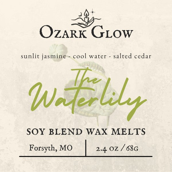 Ozark Glow The Waterlily soy blend wax melts with notes of cool creek water, wildflowers, and Ozark air.